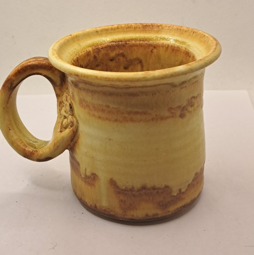 Nord Pottery Mug with beautiful handle.